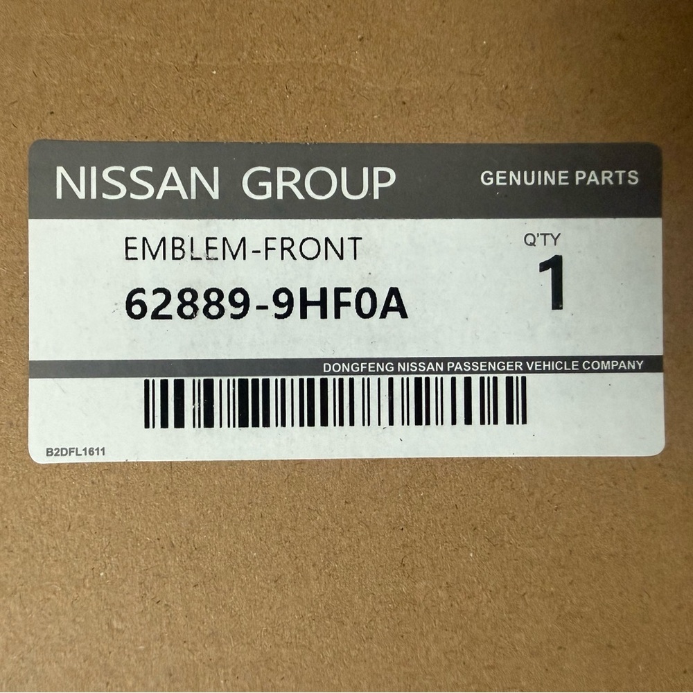 New Nissan Genuine Front Grille Emblem Badge